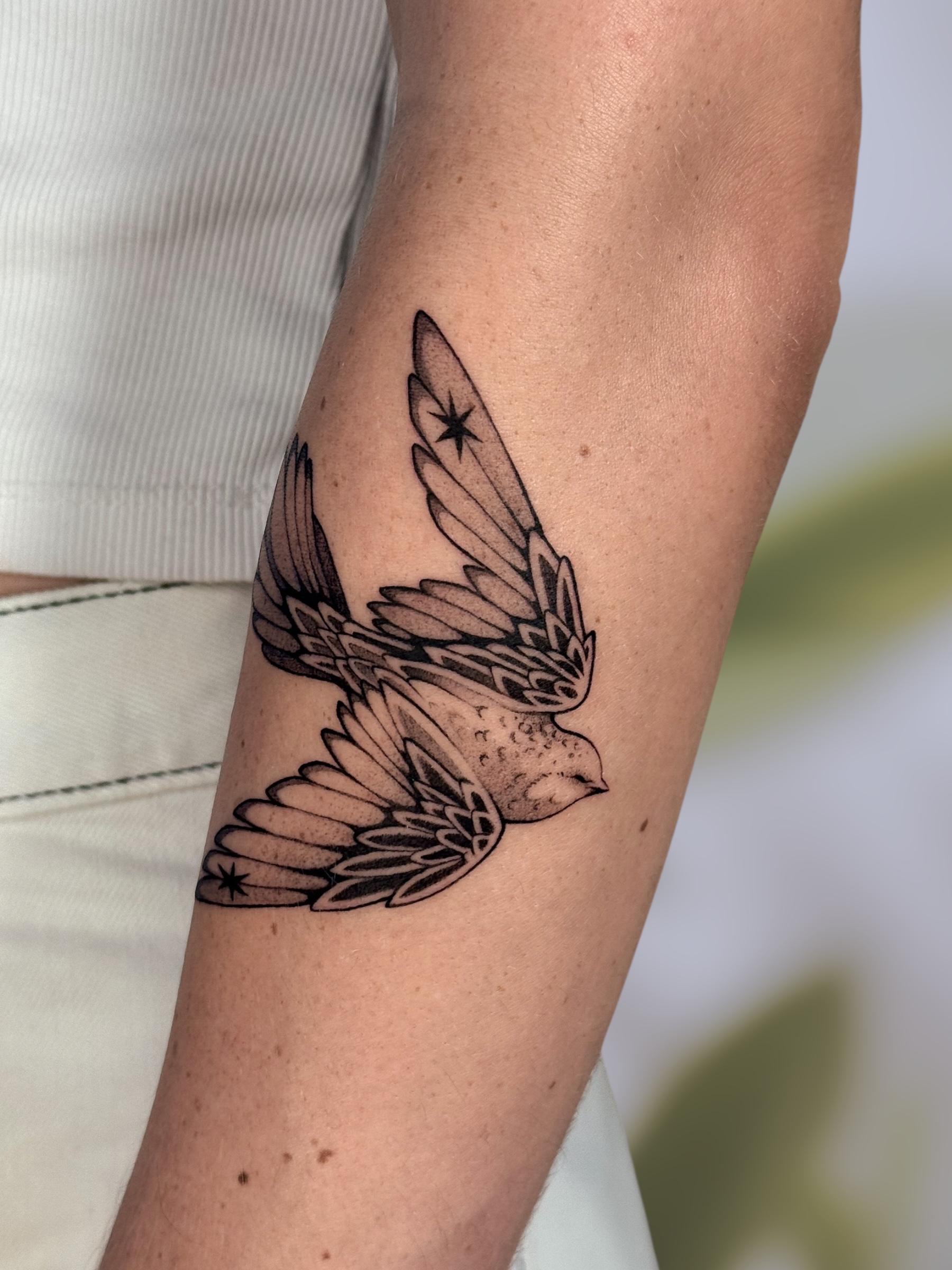 pretty tiny bird with star